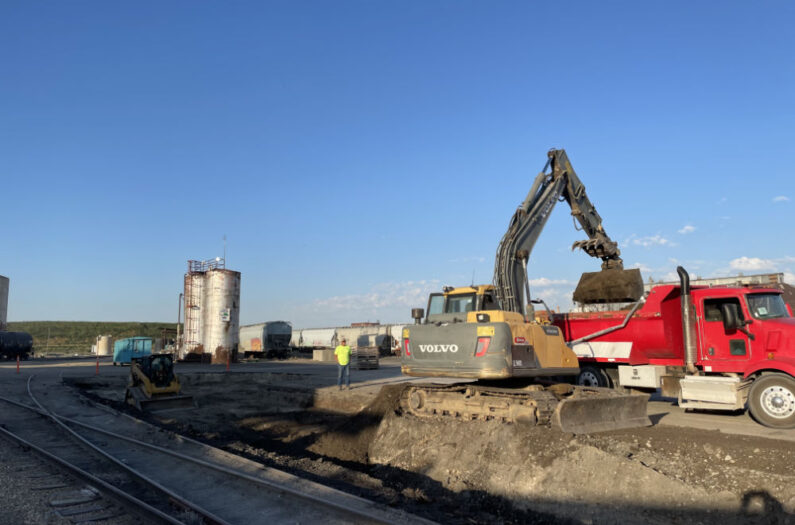 Volvo Backhoe Moving Dirt